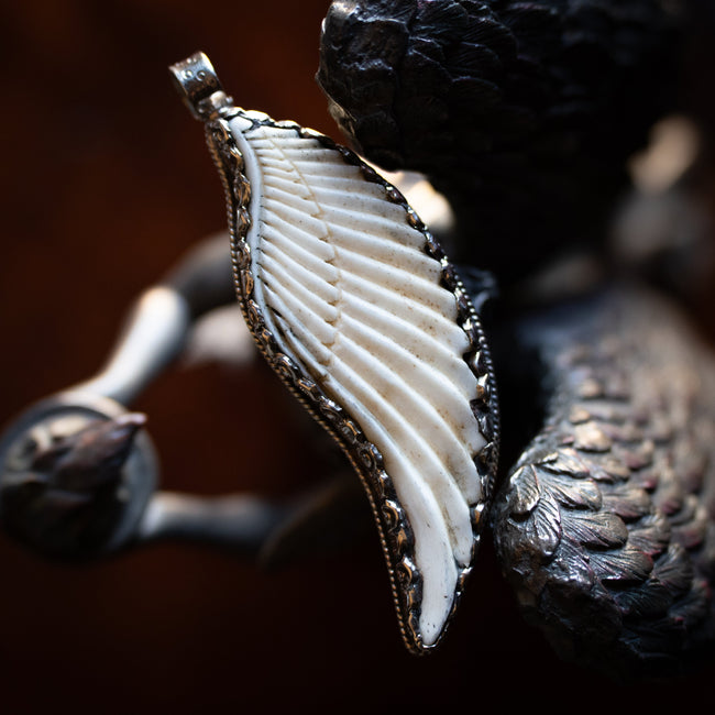 Hand-Carved Bone Wing Pendant