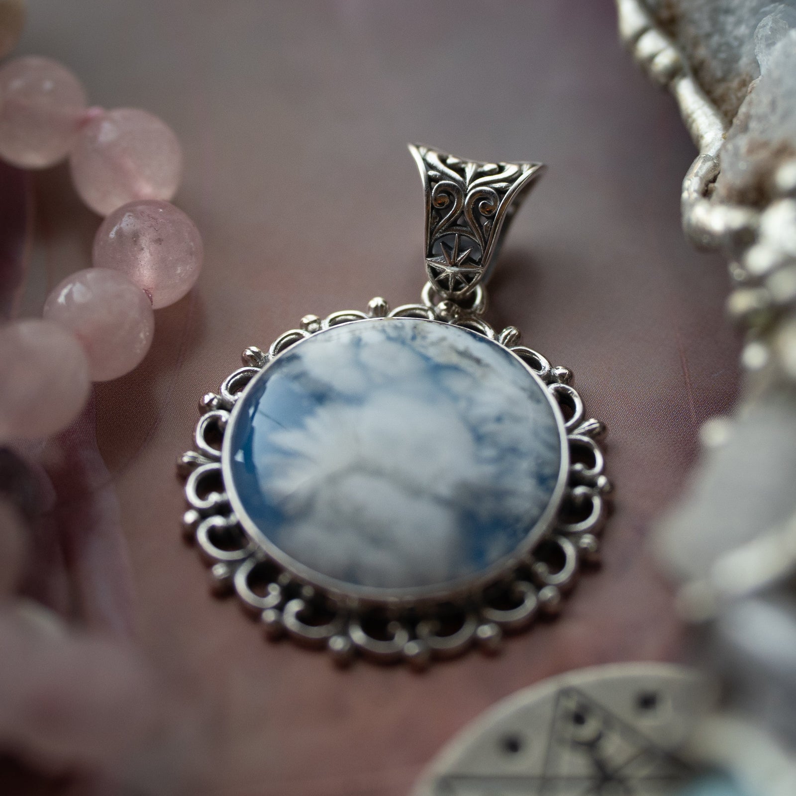 The Arcane Nimbus Pendant (Sky Plume)