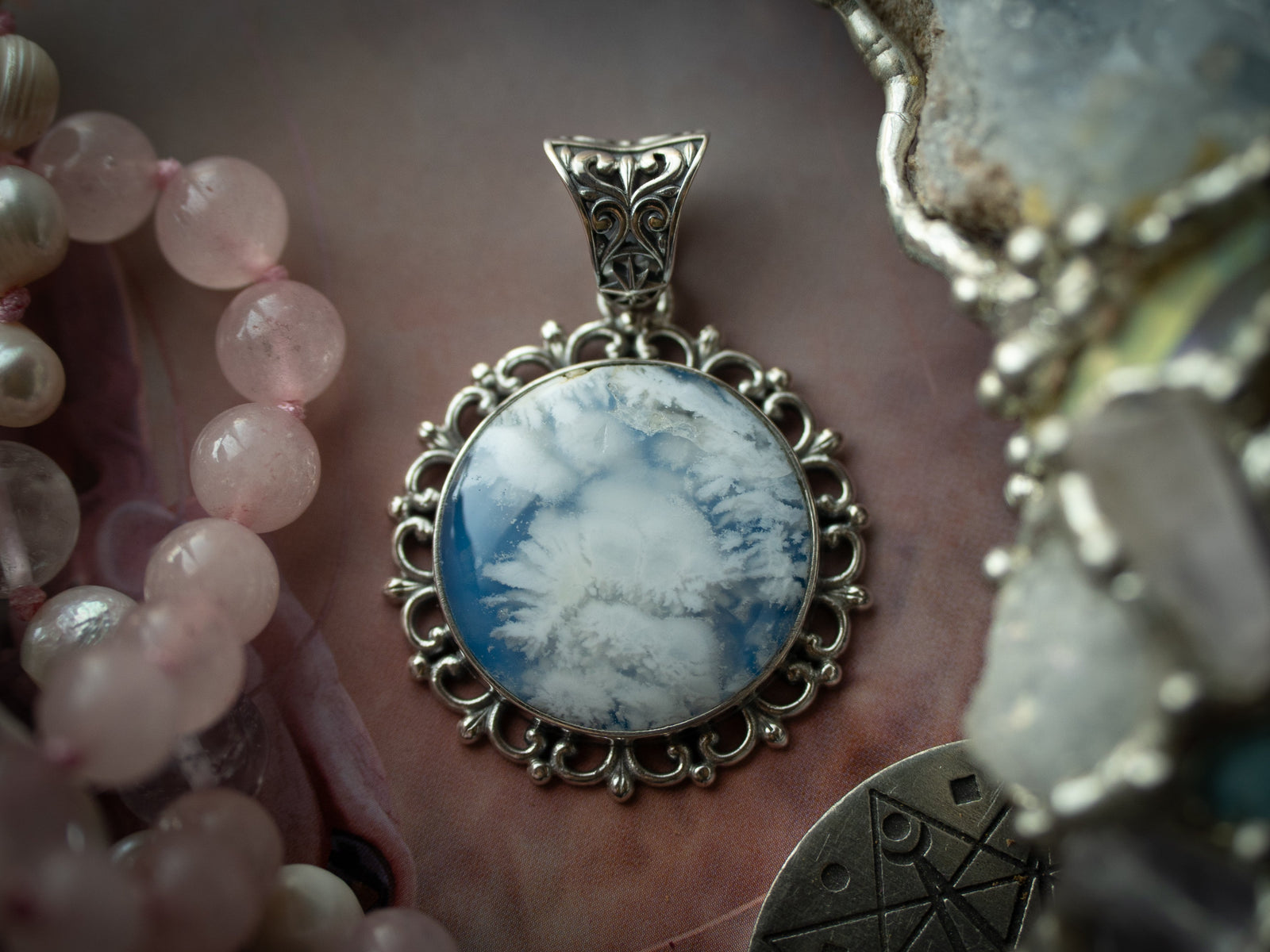 The Arcane Nimbus Pendant (Sky Plume)