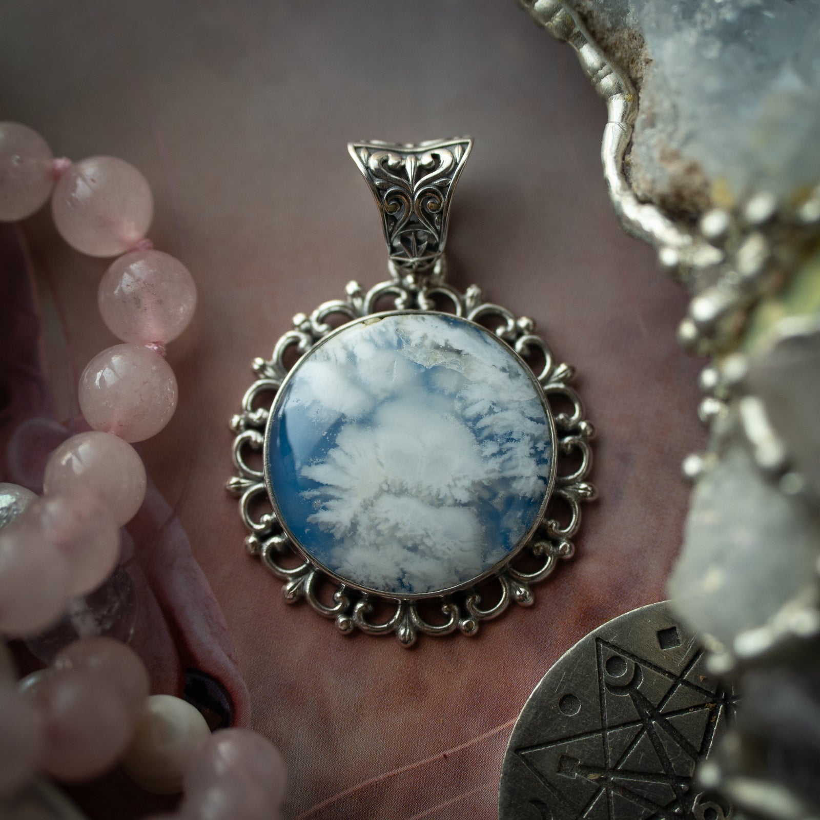 The Arcane Nimbus Pendant (Sky Plume)