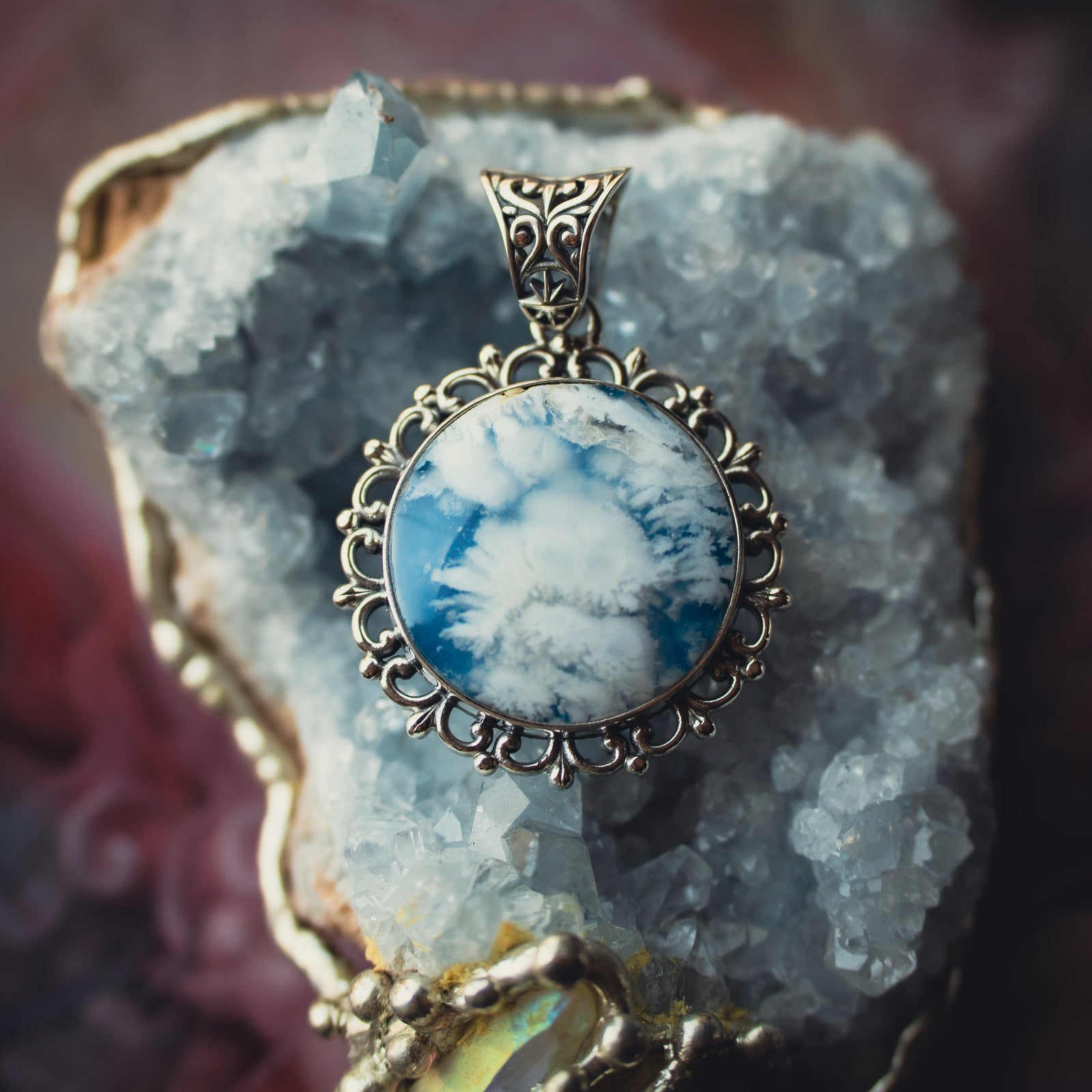 The Arcane Nimbus Pendant (Sky Plume)