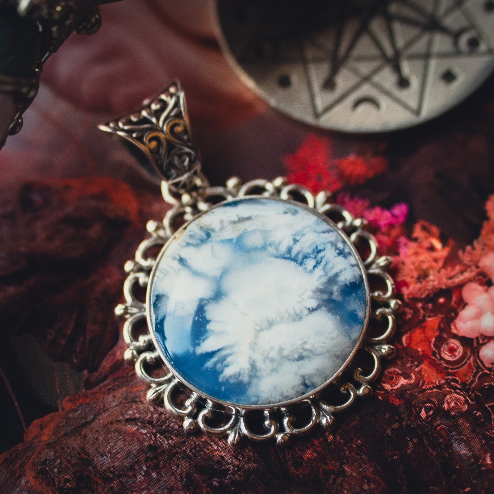 The Arcane Nimbus Pendant (Sky Plume)