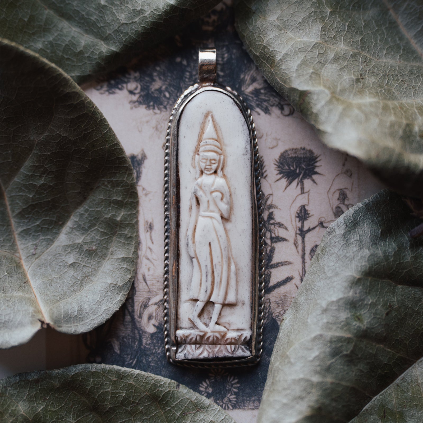 Carved Bone Buddha Pendant