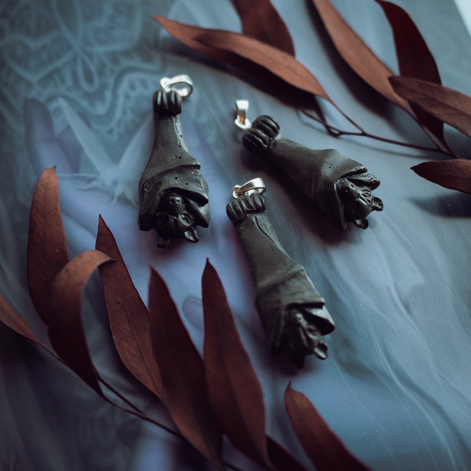 Dark Cherry Amber Bat Pendant