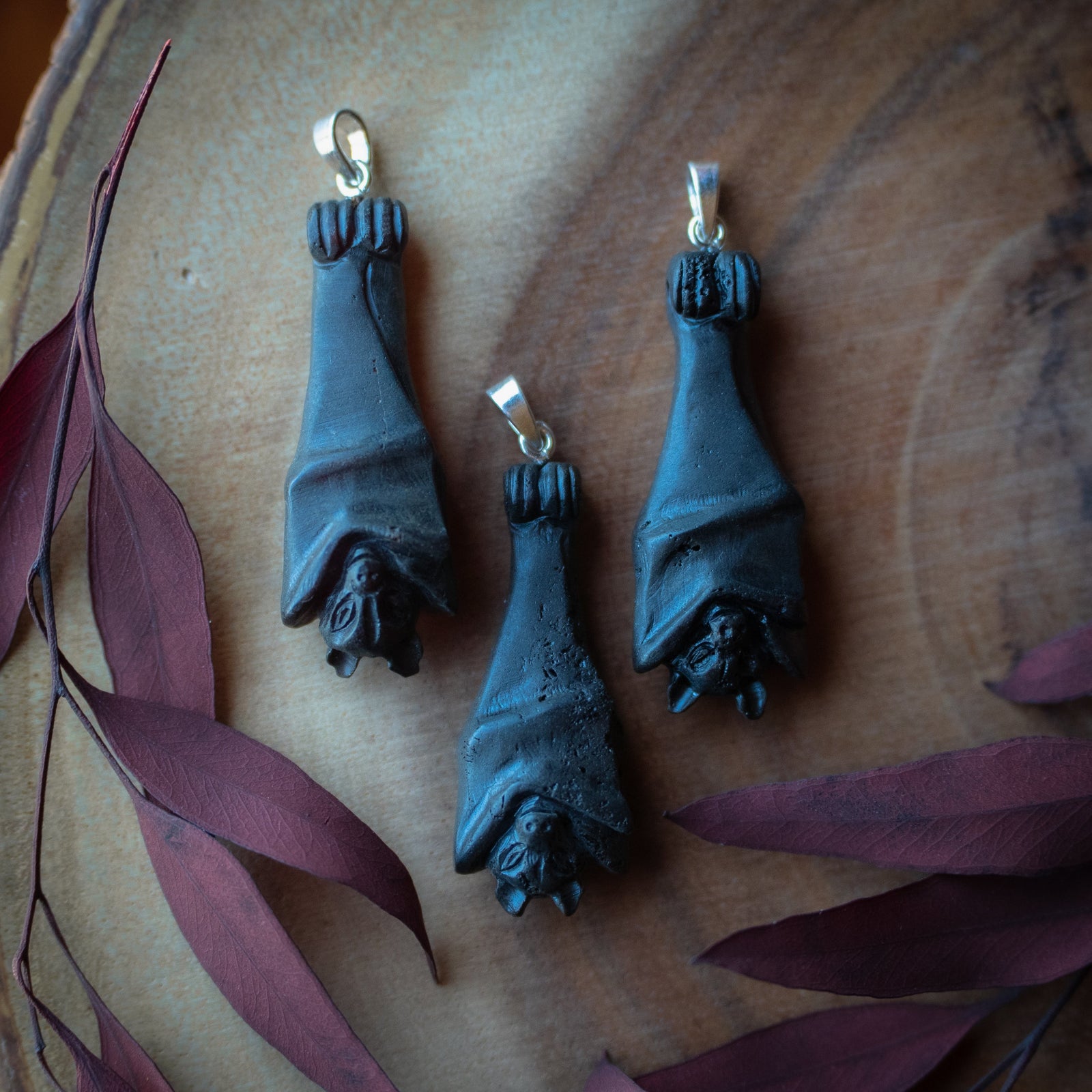 Dark Cherry Amber Bat Pendant