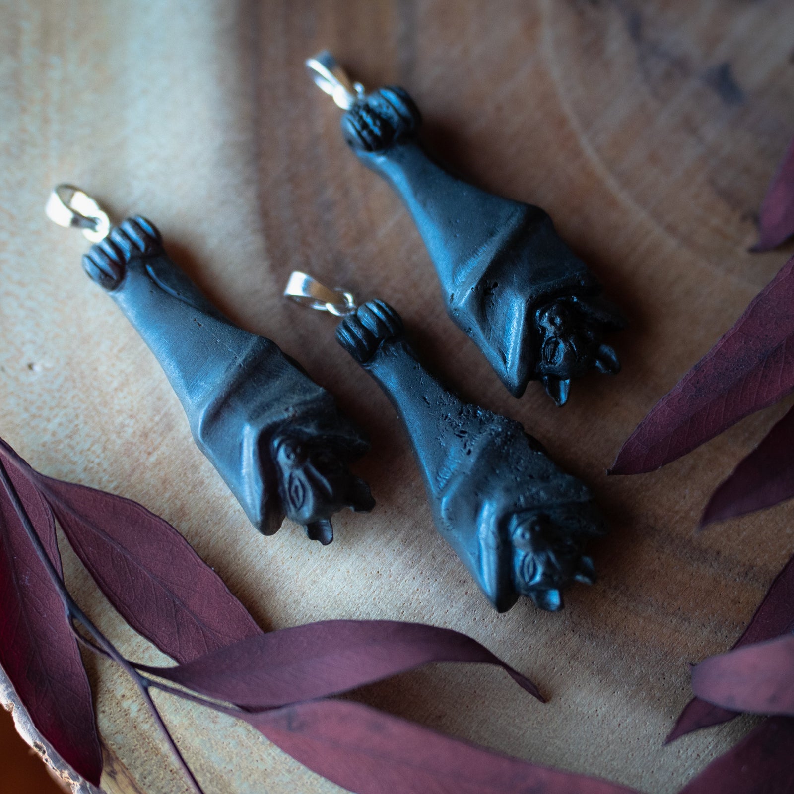 Dark Cherry Amber Bat Pendant